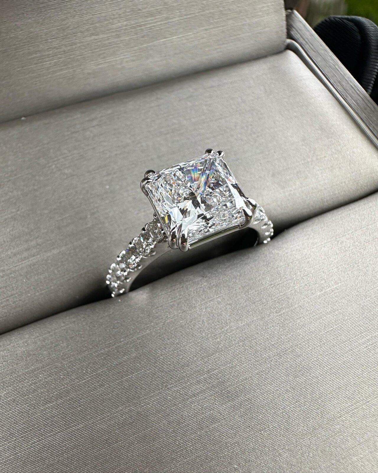 Square diamond ring in a jewelry box