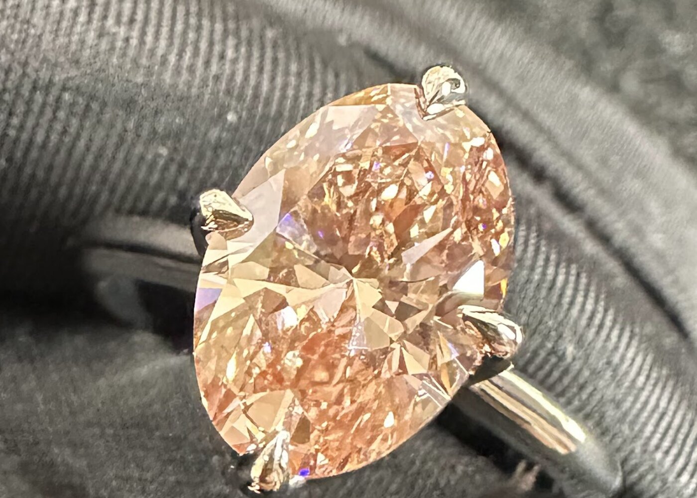 Oval statement ring with warm stone
